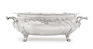 * A German Silver Jardiniere, Hermann Behrnd, Dresden, 19th Century, of oval form with rocaille handles and a similarly worked b