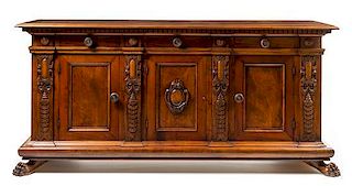 * An Italian Renaissance Style Walnut Console Cabinet Height 43 1/4 x width 92 x depth 26 inches.