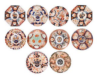 * A Collection of Imari Palette Porcelain Articles Diameter of largest 20 inches.