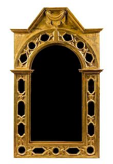 * An Italian Baroque Style Giltwood Mirror 69 1/2 x 42 3/4 inches.