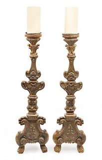 * A Pair of Italian Neoclassical Giltwood Prickets Height 39 inches.