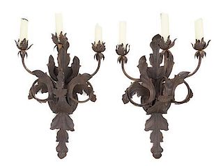 * A Pair of Wrought Metal Three-Light Sconces Height 26 inches.