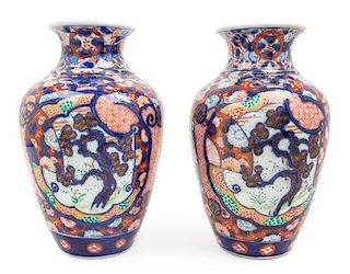 * A Pair of Imari Palette Porcelain Vases Height 12 inches.