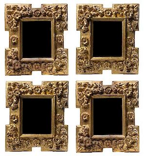 * A Set of Four Spanish Baroque Giltwood Frames Height 18 x width 16 inches.