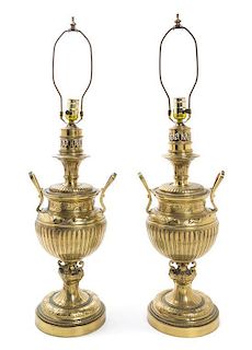 * A Pair of Brass Fluid Lamps Height 21 inches.