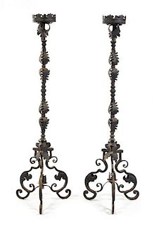* A Pair of Wrought Iron Prickets Height 67 inches.