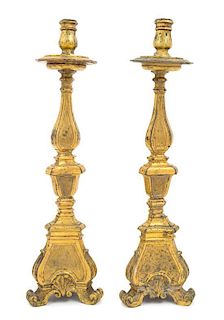 * A Pair of European Gilt Bronze Candlesticks Height 16 1/2 inches.