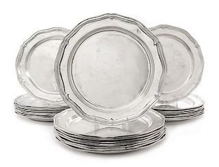 * A Set of Twenty-Five Pewter Chargers Diameter 13 1/4 inches.
