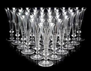 * A Set of Forty-Five William Yeoward Glass Champagne Flutes Height 8 1/8 inches.