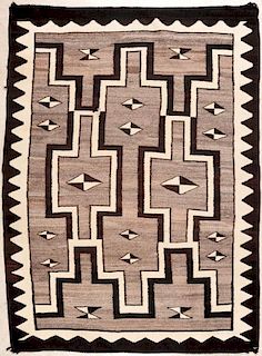 A TWO GRAY HILLS STORM PATTERN NAVAJO RUG