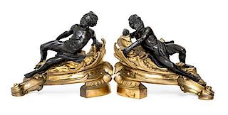 A Pair of Louis XV Style Gilt and Patinated Bronze Figural Chenets Height 14 x width 17 inches.