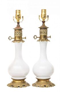 A Pair of French Glass Oil Lamps Height 18 1/2 inches.