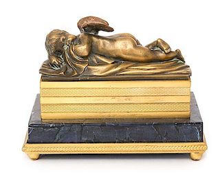 A French Empire Bronze and Lapis Model of a Resting Putti