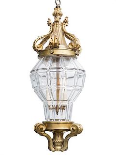 A French Gilt Bronze and Glass Lantern Height 26 inches.