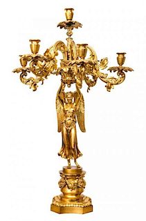 An Empire Style Gilt Bronze Seven-Light Figural Candelabrum Height 34 1/4 inches.