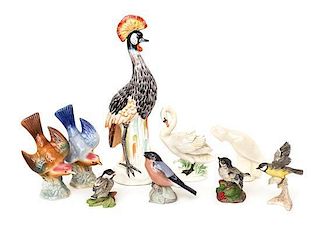A Collection of Nine Porcelain Models of Birds Height of tallest
