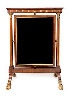 A French Empire Style Parcel Gilt Mahogany Cheval Mirror Height 47 3/4 x width 34 inches.