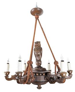 A Black Forest Style Carved Oak Six-Light Chandelier Diameter 41 inches.