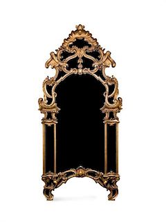 A Rococo Style Giltwood Mirror Height 77 x width 38 inches.