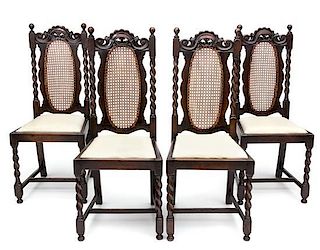 A Set of Four Jacobean Style Oak Dining Chairs Height 42 inches.