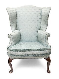 A Queen Anne Mahogany Wing Chair Height 46 inches.