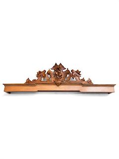 A Carved Mahogany Window Cornice Length 61 inches.