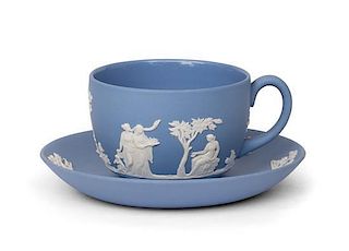 A Wedgwood Jasperware Cup and Saucer. Diameter of saucer 5 1/4 inches.