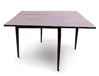 An American Walnut Drop-Leaf Table Height 29 x width 62 x depth 48 inches (open).