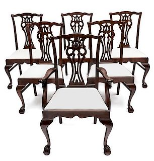 A Set of Six Chippendale Style Mahogany Dining Chairs Height 38 inches.