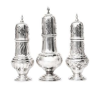 An Edwardian Silver Caster, Birmingham, 1905-1906, together with two silver-plate casters.