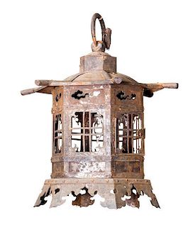 A Chinese Pressed Metal Lantern. Height 15 inches.