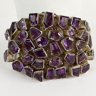 Lady's Thirty Eight (38) Multi Cut Amethyst and White Metal Bracelet.