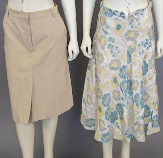 Two Marc Jacobs skirts, one cotton tan with peach trim and the other rayon green, yellow, and white flowers.