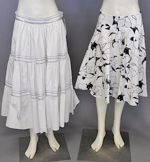 Two Ralph Lauren women's skirts, black and white cotton print and ruffled with silver rim, one new with tag $598 size 6.