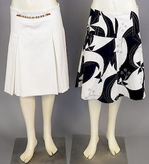 Two skirts including Dolce & Gabbana black and white and a Celine cream skirt.