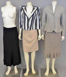 Giorgio Armani five piece women's group to include two suit jackets, two tan skirts, and a long black skirt.