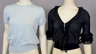 Two new women's shirts including Moschino black retail $780 and Luca Luca blue $790.