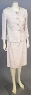 Chanel two piece suit including light pink novelty yarn jacket with ivory trim and matching skirt (size 42).