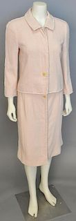 Chanel two piece tweed boucle peach suit with jacket and skirt.