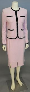 St. John two piece suit, pink jacket with zipper and black trim and matching skirt.