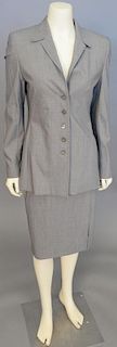 Escada women's three piece lot including grey suit jacket with two skirts.