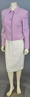 Escada three piece suit with purple tweed short jacket, multi-colored tweed skirt, and white tweed skirt .