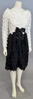 Arnold Scaasi, 1990s, Cocktail dress with black skirt with applied black dangles of machine-embroidery; bodice is white with similar dangles in white.