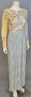 Mary McFadden, c. 1990s, Evening dress with crinkle-pleated gray silk skirt and bodice of chiffon in shaded gray and yellow, with floral design hand-e