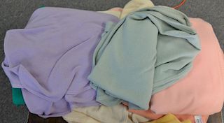 Seven wool shawls / capes including red, white, blue, green, peach, pink, and purple.