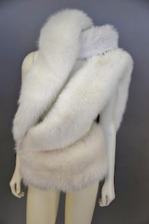 Four white fur pieces including scarf and neck warmer.