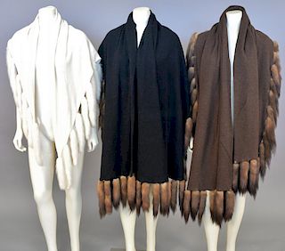 Three cashmere or wool scarves with mink trim including a white, brown, and black.