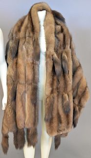 Maximillian brown mink fur shawl or wrap along with a fox scarf.