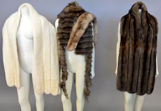 Group of seven fur and mink shawls or scarves.