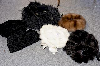 Six hats including three Kokin and Givenchy white mink, a black mink, and a brown mink.